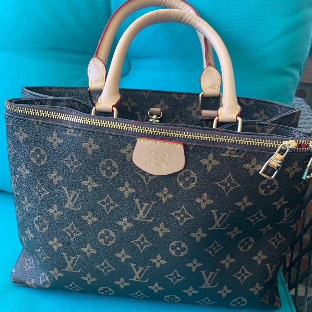 Faux Louis Vuitton purse.